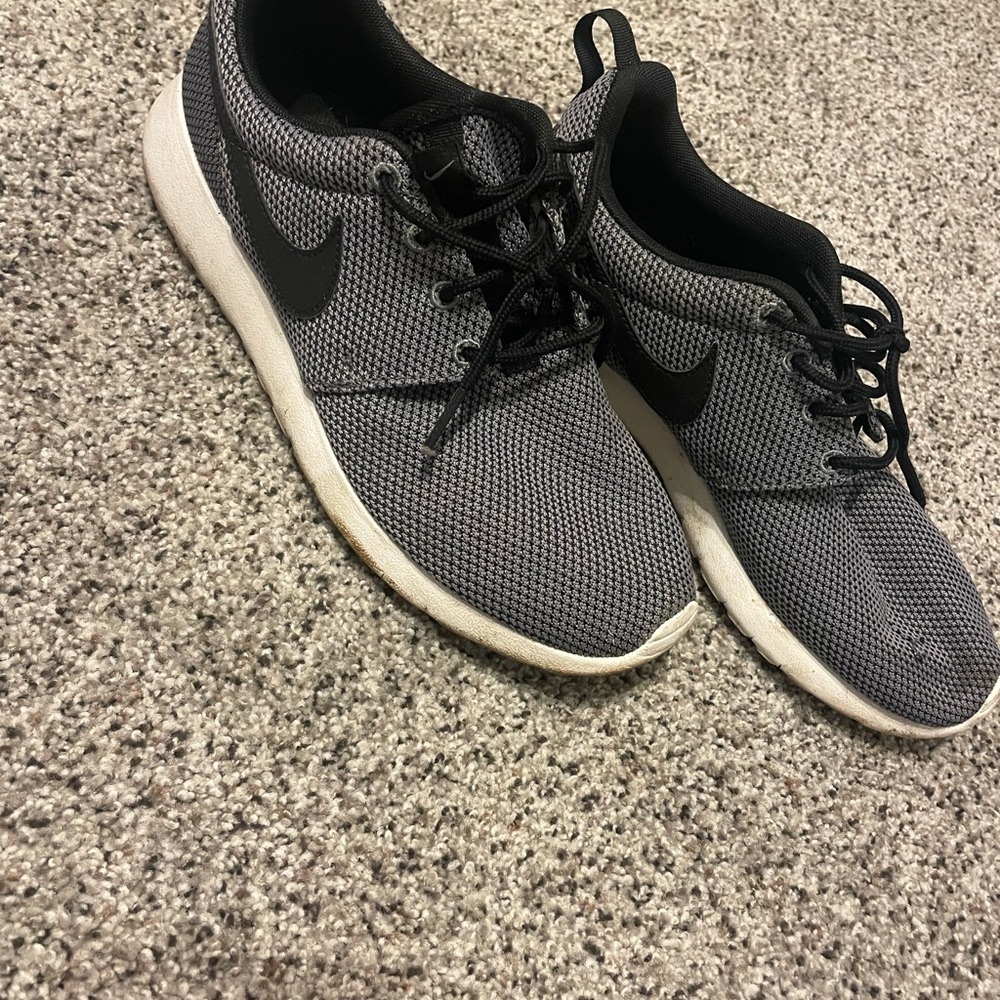 Nike cross training, small tear in left shoe but great condition.